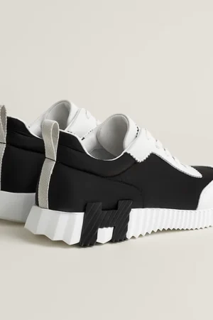 HERMÈS BOUNCING SNEAKER BLACK, WHITE & ORANGE